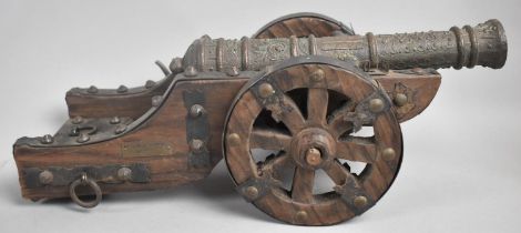 A Wooden and Metal Model of a Charles I Spanish Field Cannon, 31cms Long