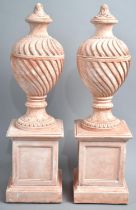A Pair of Reproduction French Style Lidded Vases on Plinth Bases, 34.5cms High