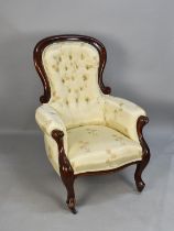 A Reupholstered Late 19th Century Mahogany Framed Balloon Backed Button Upholstered Ladies Arm Chair