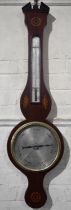 A 19th Century Inlaid Mahogany Wheel Barometer with Thermometer by Silo of Manchester