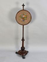 A Victorian Mahogany Rise and Fall Pole Screen with Circular Tapestry Panel on Circular Base with