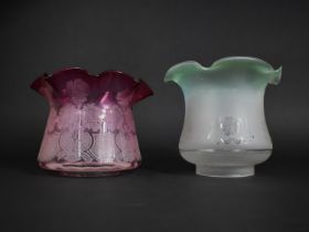 A Cranberry Glass Shade with Wavy Rim and Floral Decoration together with an Opaque Example with