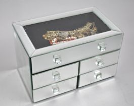 A Modern Mirrored Jewellery Box with Five Drawers Containing Costume Jewellery, 29cms Wide