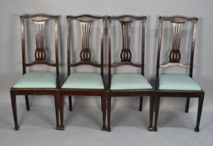 A Set of Four Edwardian High Back Dining Chairs
