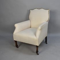A Reupholstered Edwardian Armchair