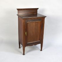 An Edwardian Mahogany Bedside Cupboard with Panelled Door and Raised Gallery Back, 48cms Wide