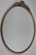 A Circular Framed Wall Mirror with Scrolled Finial, 75cm Diameter