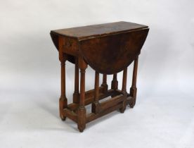 A Late 19th Century Small Oak Circular Topped Gate Leg Drop Leaf Table, Single End Drawer, 75cms