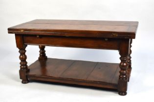 A Good Quality Mid 20th Century Oak Rectangular Coffee Table with Two Hinged Flaps to Extend,