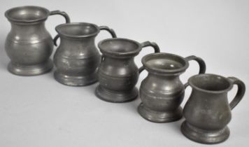 A Collection of Five Small Pewter Measures, One Inscribed for LMS Hotels