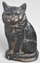An Early/Mid 20th Century Black Painted Cast Iron Doorstop in the form of a Seated Cat, 17cms High