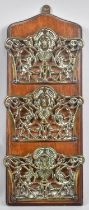 A Victorian Brass and Mahogany Three Tier Wall Hanging Letter Rack, 35cms High