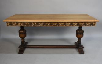 A Mid 20th Century Oak Rectangular Coffee Table with Twin Bulbous Supports, 132cms by 57cms