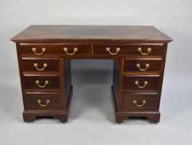 A Mid/Late 20th Century Mahogany Kneehole Writing Desk with Two Long Drawers and Banks of Three