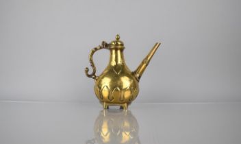 A 19th Century Brass Islamic Coffee Pot/Ewer with Hinged Ogee Cover and Scrolled Handle, Straight