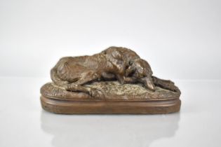 A Cold Cast Bronze Sculpture After Paul Gayrard Modelled By M.Deca 'Recumbent Deer Hound' Signed,