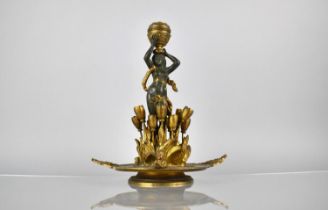 A French Empire Style Bronze and Ormolu Table Centre Modelled with Nude Supporting Candle Holder