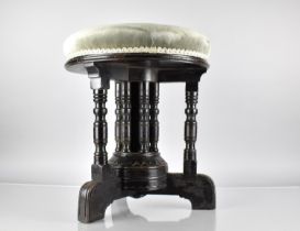 A 19th Century Ebonised Piano Stool Designed By Bruce Talbert and Stamped Gillow, 40cm Diameter x 45