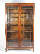 A Nice Quality Burr Walnut Glazed Bookcase with Six Adjustable Shelves, 103x29x173cms High