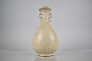 A Chinese Celadon Glazed Vase of Bottle Form with Zoomorphic Handles and Deighty Ovals to Neck,