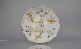 An 18th Century Italian Glazed Majolica Footed Bowl of Lobed Form Decorated with Cherub within