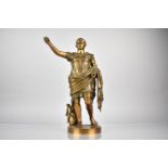 A Bronze Figure Of Augustus Caesar, Depicted with Arm Outstretched and with Putto by His Side,
