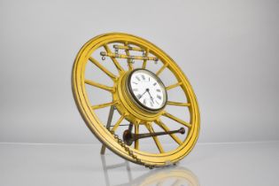 An Early 20th Century Novelty Clock in the Form of a 14 Spoke Cart Wheel with Swingle Tree and Horn,
