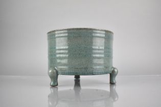 A Chinese Celadon, Crackle Glazed Censer on Short Tripod Supports and Ribbed Body, 13.5cm High &