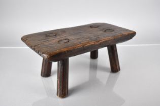 A 19th Century Rectangular Elm topped Stool with Four Turned Supports, 30x17.5x13cm High