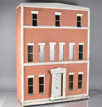 A Large Dolls House in the Form of a Georgian Three Story House, 71x25x93cms High