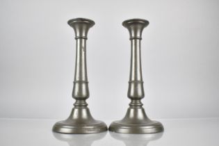 A Pair Of Late 18th Century George III Pewter Candlesticks With Push-Up Ejectors. 23cm High