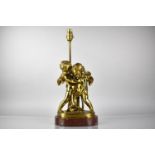 A Bronze Figural Lamp Base Depicting Cupid and Cherubs in Arms on Naturalistic Base and Raised on