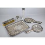 A Collection of Silver Dressing Table Items To Comprise Tray with Repousse Decoration by Williams