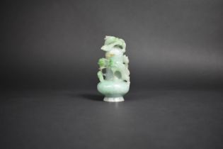 A Jade Bottle Carved in High Relief with Entwined Dragons, 10cm High.