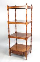 An Edwardian Mahogany Four Tier Rectangular Whatnot with Turned Supports and Base Drawer, 47cms Wide