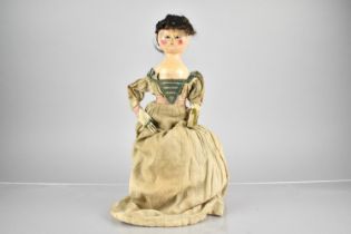 An 18th/19th Century Carved Wooden Doll/Peg Doll with Original Painted Decoration having Inset