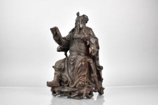 A Late 19th Century Chinese Root Carved Figure of Seated Warrior Reading Book. Some Losses and