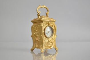 A Miniature Gilt Bronze Reproduction Carriage Clock in the French Art Nouveau, with Key and