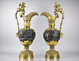 A Large and Impressive Pair of Continental Gilt Bronze Decorative Ornamental Ewers Decorated in