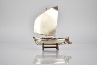 A Silver and Teak Study of a Yacht, Stamped 925, 11cms Wide and 13cms High