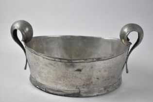 A Heavy Two Handled Oval Pewter Bowl, 36cm Wide