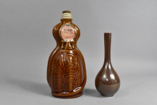 A Chinese Tortoise and Snake Remedy Bottle (Empty), 22cm high Together with a Chinese Monochrome