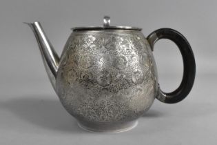 An Early 20th Century Silver Plated Teapot with Finely Engraved Floral Decoration