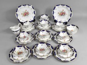 A Floral and Cobalt Blue Inset Trim Decorated Tea Set Enriched with Gilt Highlights to Comprise