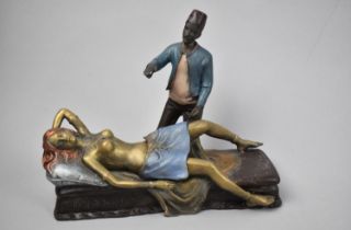 A Reproduction Cold Painted Bronze Figure Group in the Manner of Bergman Depicting Arabic Magician