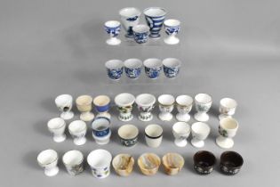A Collection of Various Egg Cups to Include Examples by Coalport, Portmeirion, Wedgwood Fallow