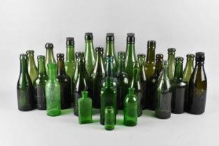 A Collection of Various Glass Beer Bottles etc