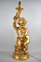 A Large Gilt Painted Plaster Figural Table Lamp Base in the Form of Cherub Holding Torch, 78cms High