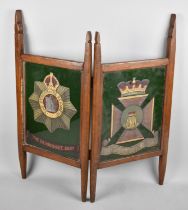 A Hand Made Two Section Screen Decorated with Badges of Devonshire and Wiltshire Regiments. 66.