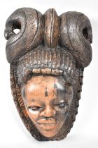 A Souvenir Carved Wooden Tribal Mask, 24cms High